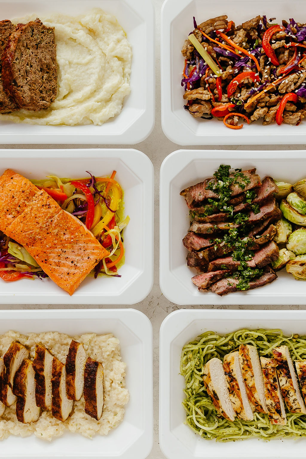 Six Glyvance meals in trays — ready to heat and eat